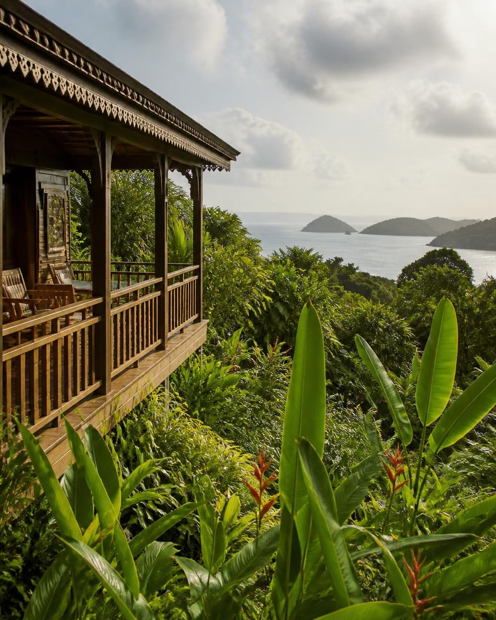 Creole villa in Guadeloupe with a pool set among palms above the Caribbean sea