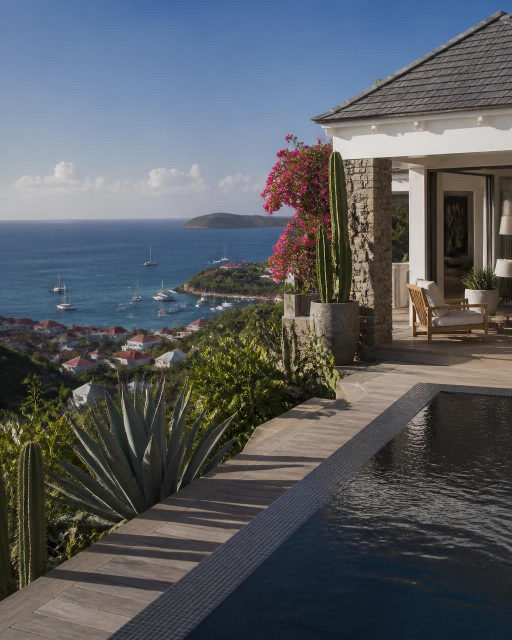 Hillside villa in St Barth with an infinity pool overlooking the Caribbean at sunset